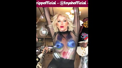 Toyah Willcox - Bubble in dark-hued mesh top