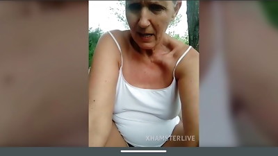 Grannie Lukerya does underwear flash in the woods